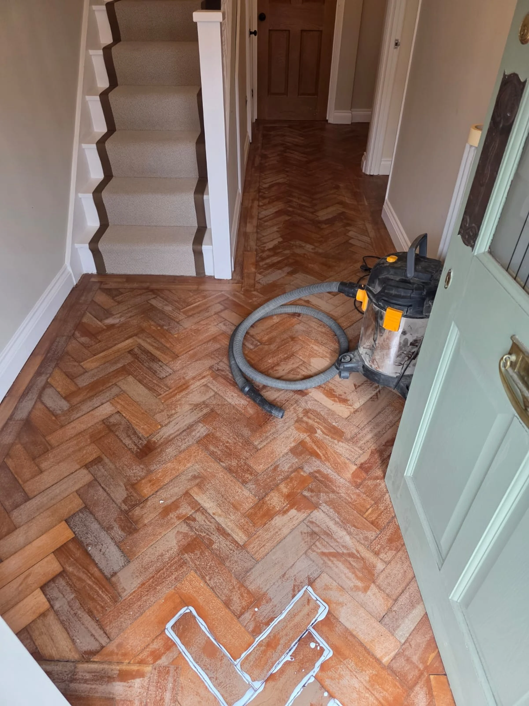 Original parquet floor before restoration